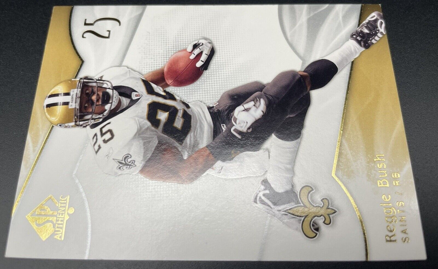 2009 SP AUTHENTIC REGGIE BUSH NEW ORLEANS SAINTS #84